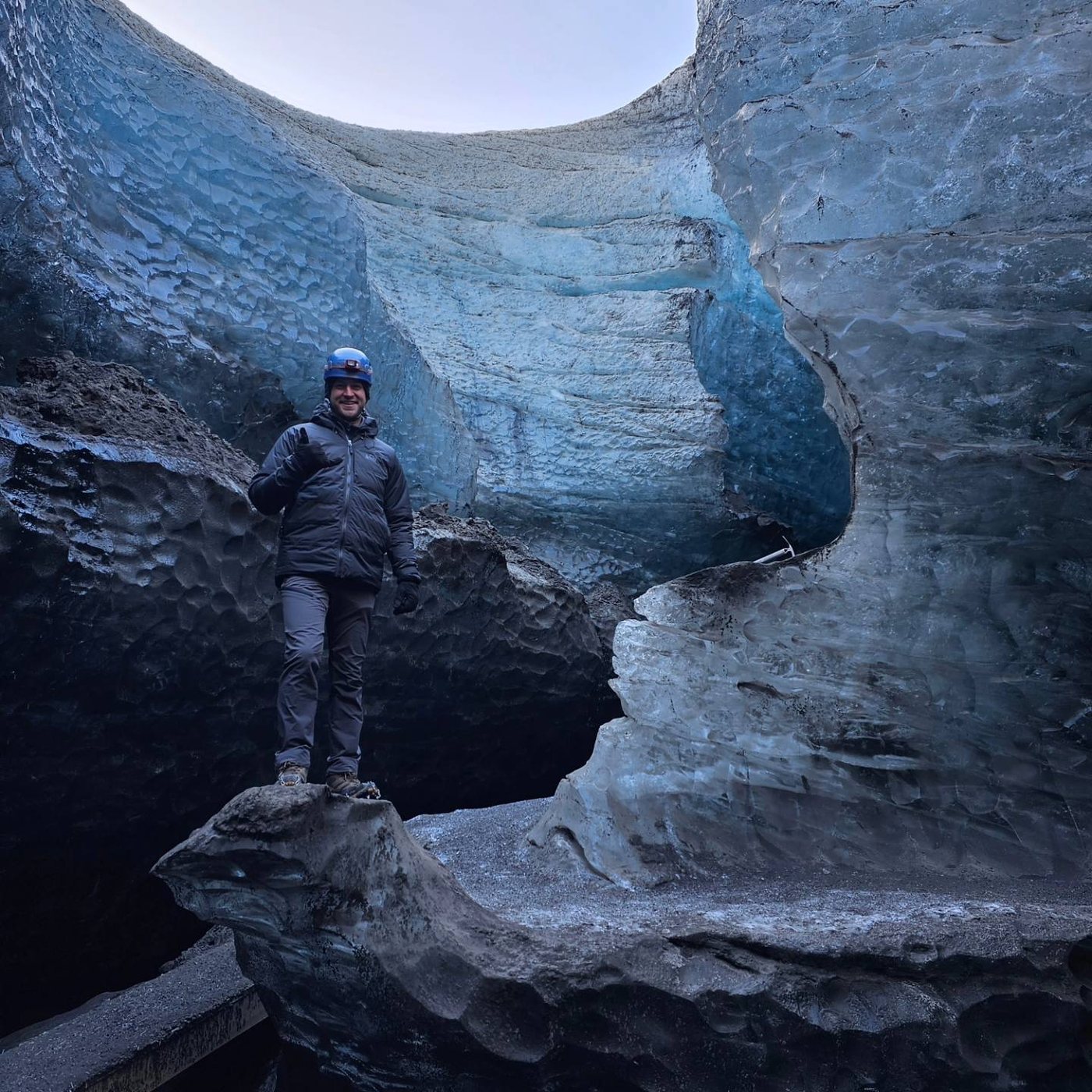 Tyler Woodall inside a blue glacier ice cave in Iceland